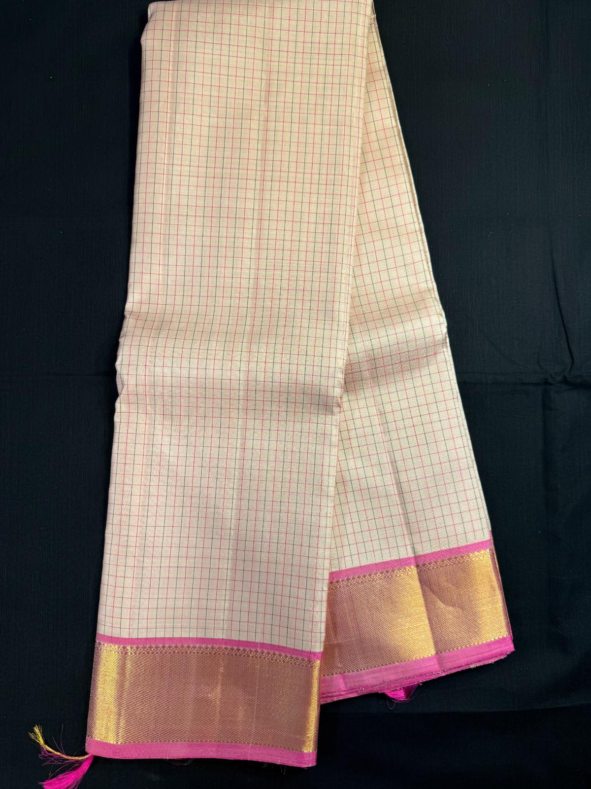 Beige Pure Kanjivaram Pattu with small checks and Pink kadi border