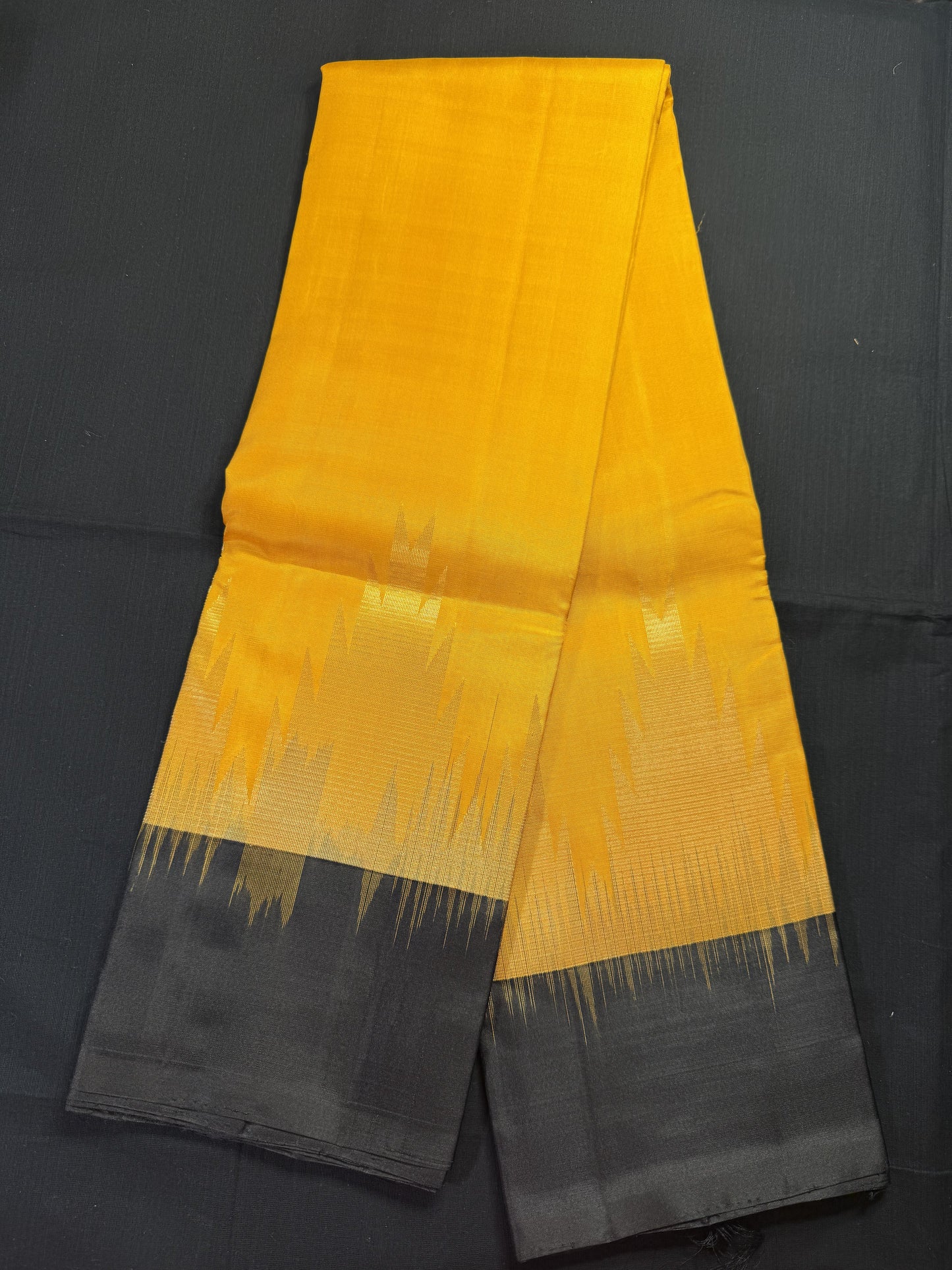 Mustard yellow pure kanjivaram pattu with temple black border