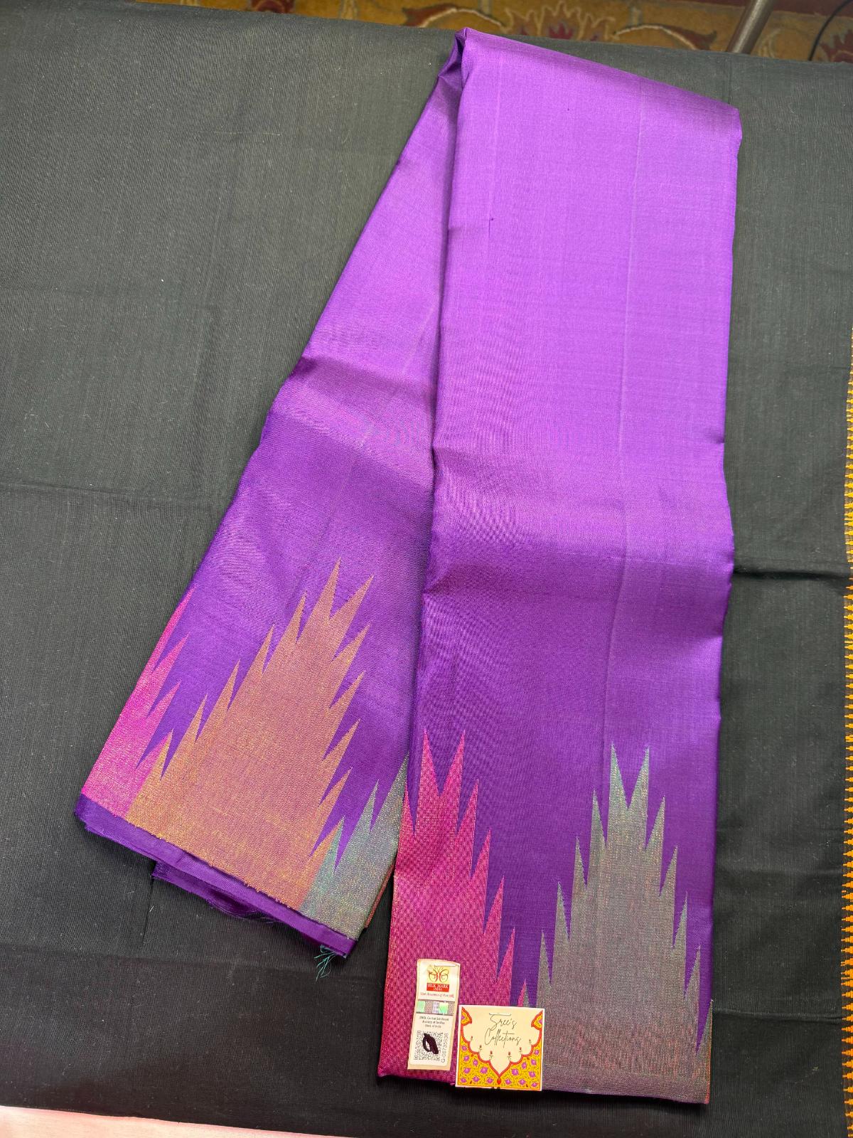 Purple pure kanjivaram pattu with multi color temple border