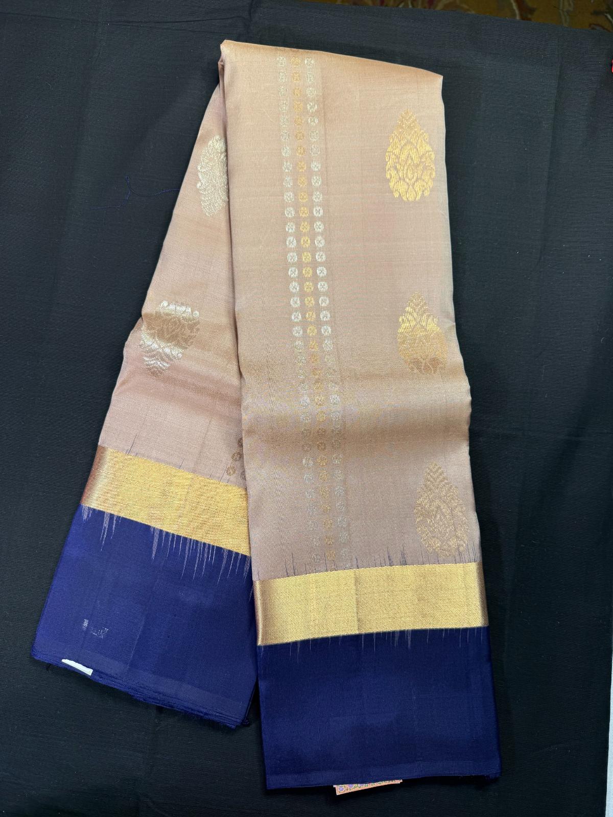 Beige Pure Kanjivaram Pattu, Double Border Royal Blue and Kadi, Big Butas All Over, Silver and Gold Buta Lines