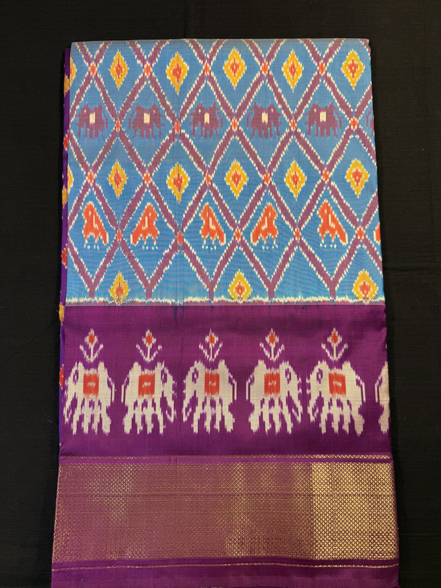 Light Blue Ikkat Pochampally With Big Kadi Border and Elephant Design Above