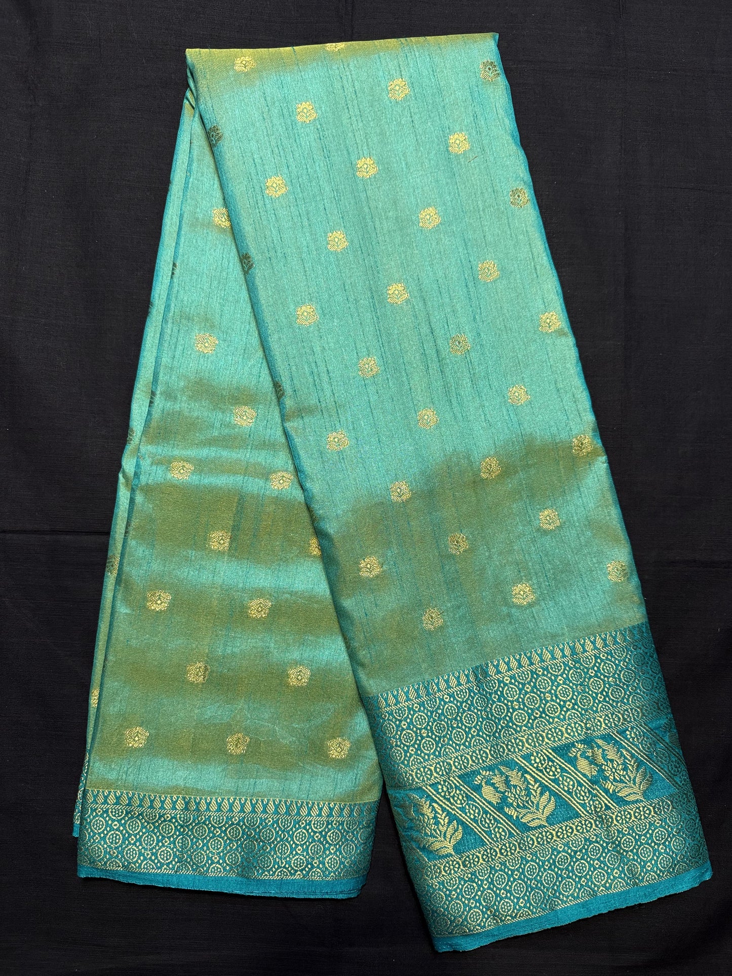 Peacock Green Fancy Saree, with small gold buta all over, dark green border with peacocks