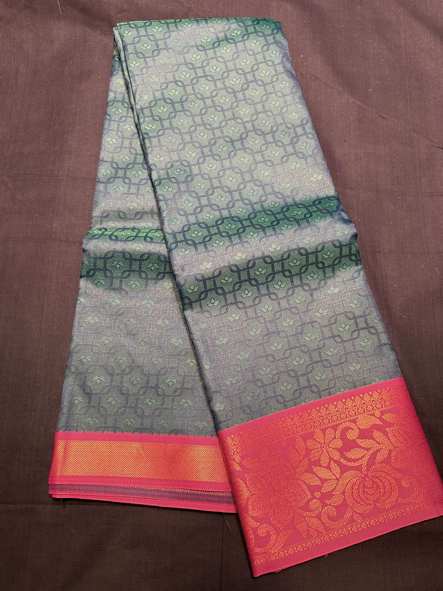 Bottle Green Fancy Saree, jacquard all over, magenta border with copper jari floral design