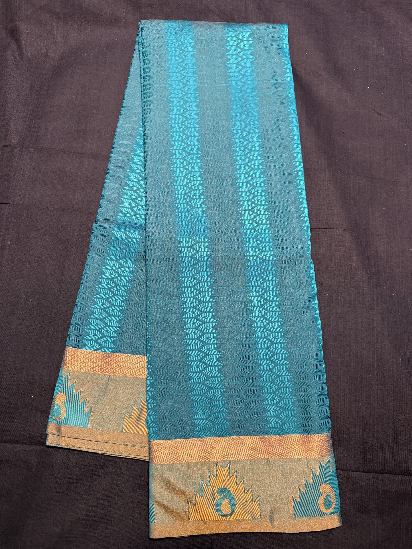 Peacock Green Fancy Saree, with jacquard all over patter design, kadi border and self border with temple design