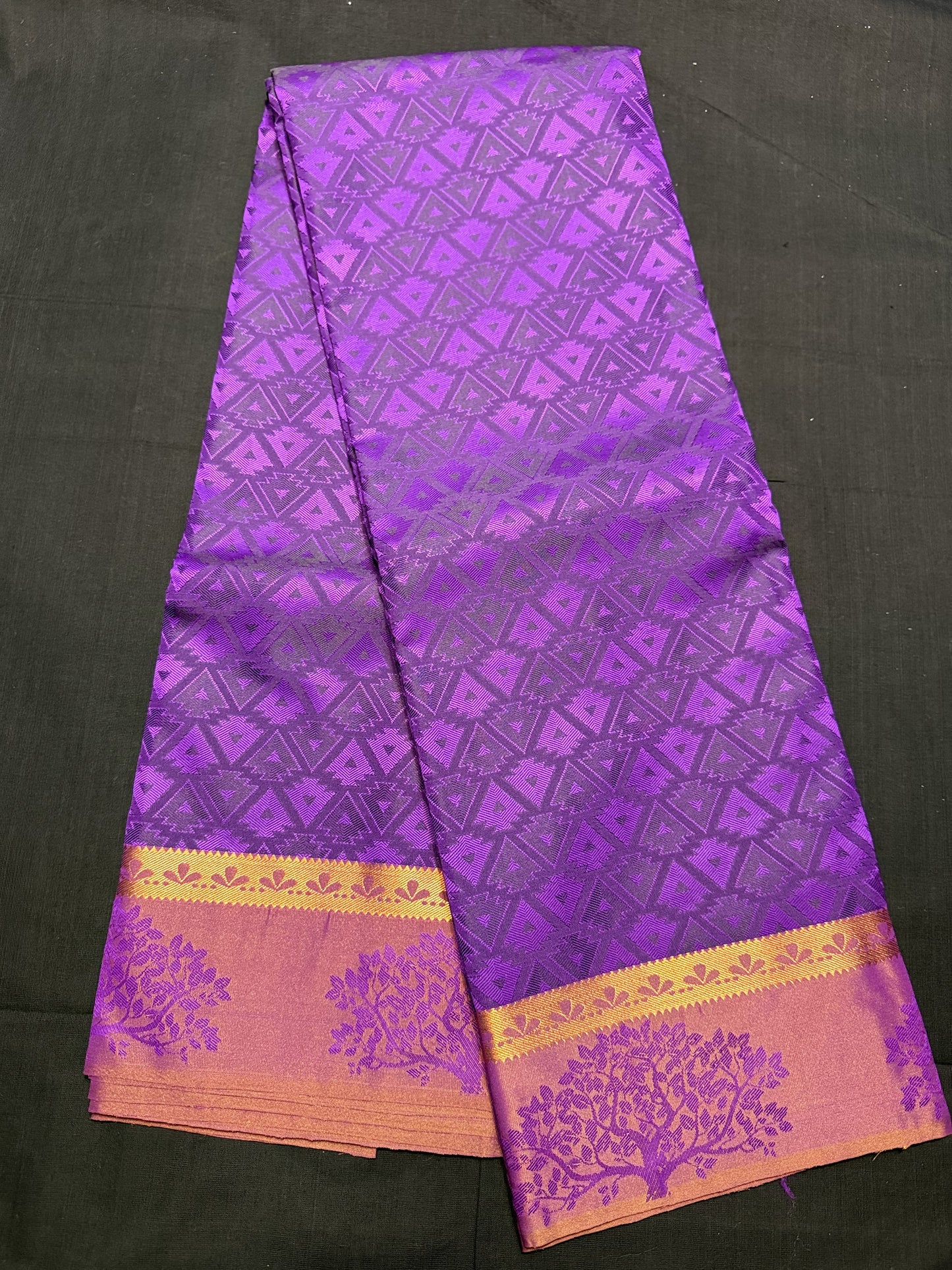 Purple Fancy Saree, with jacquard all over arrows design, kadi border and self border with trees design