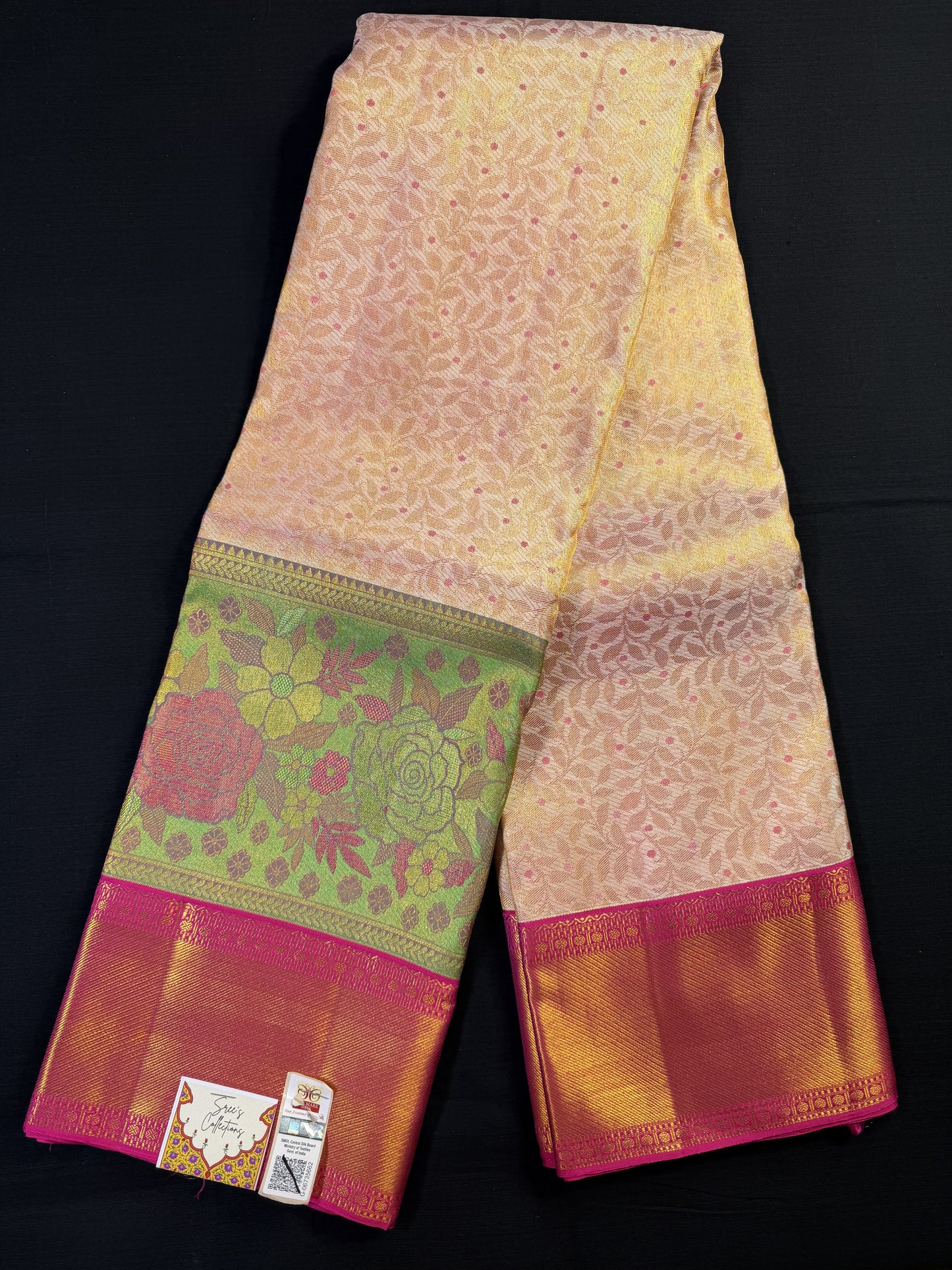 Light Peach Pure Kanjivaram Pattu With Gold Jacquard All Over Leaf Design, Pink Small Thread Butas, Big Double Border With Roses Garalnds and Kadi Border