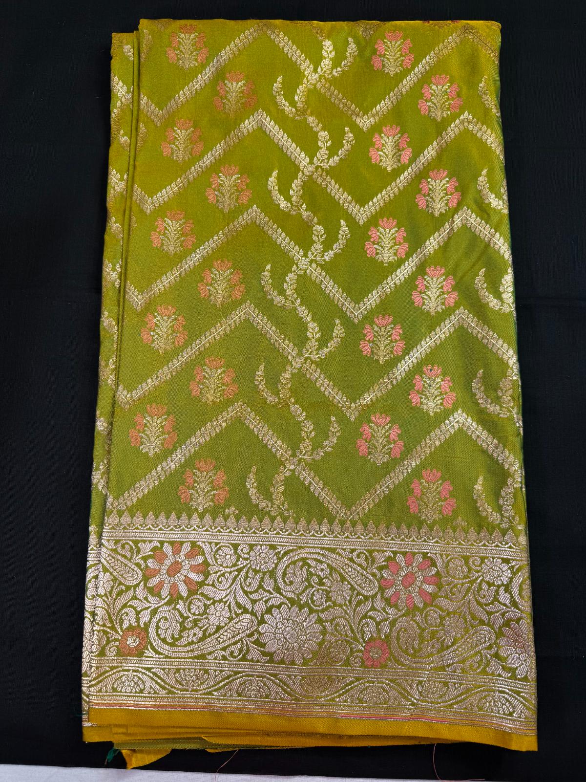 Pista Green Banarasi with full meenakari work with waves design