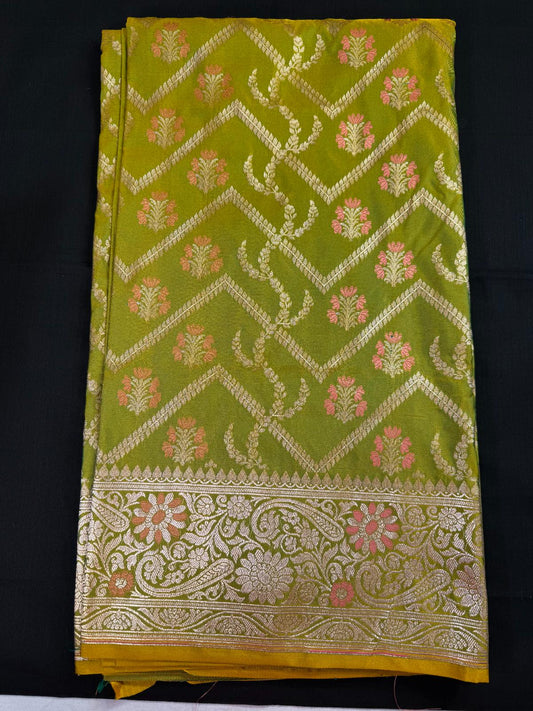 Pista Green Banarasi with full meenakari work with waves design