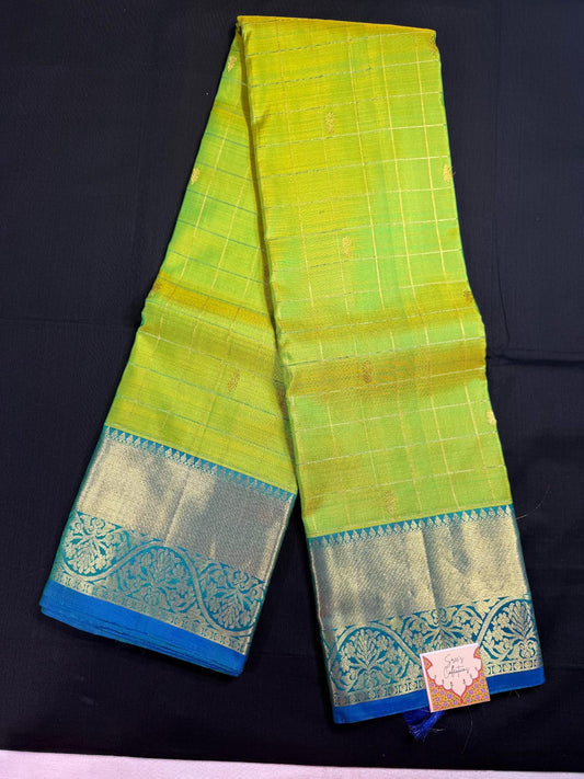 Green Pure Kanjivaram Pattu with checks, mango butas and blue borders
