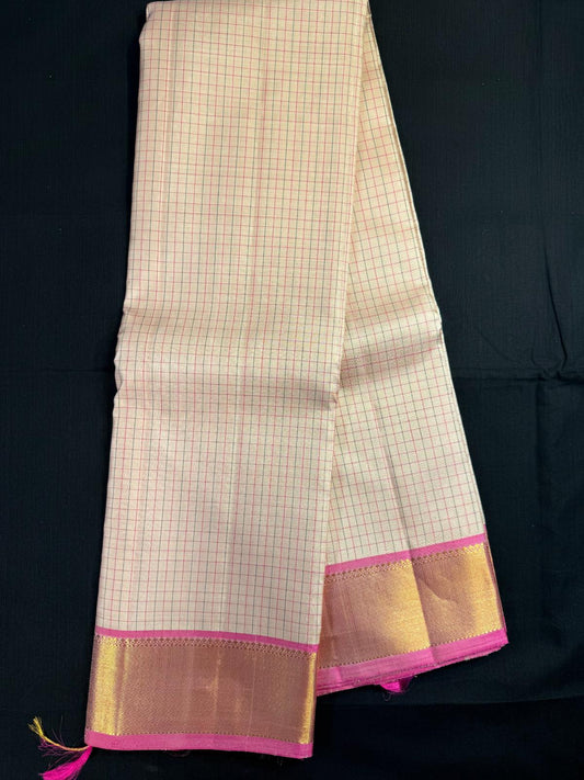 Beige Pure Kanjivaram Pattu with small checks and Pink kadi border