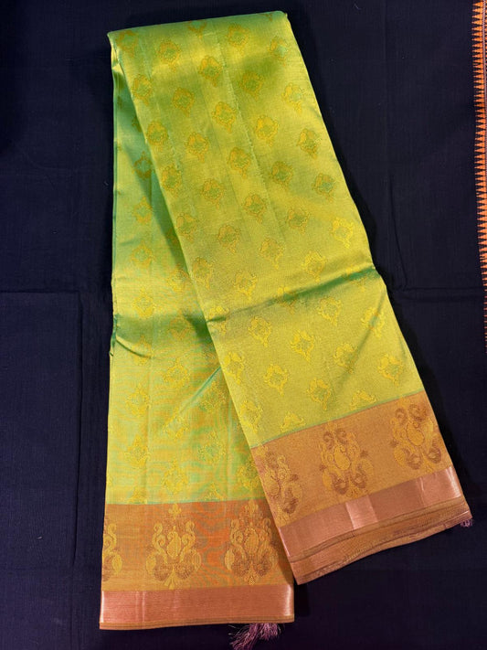 Green Pure Kanjivaram Pattu with all over self butas with Golden yellow border with butas and kdai border