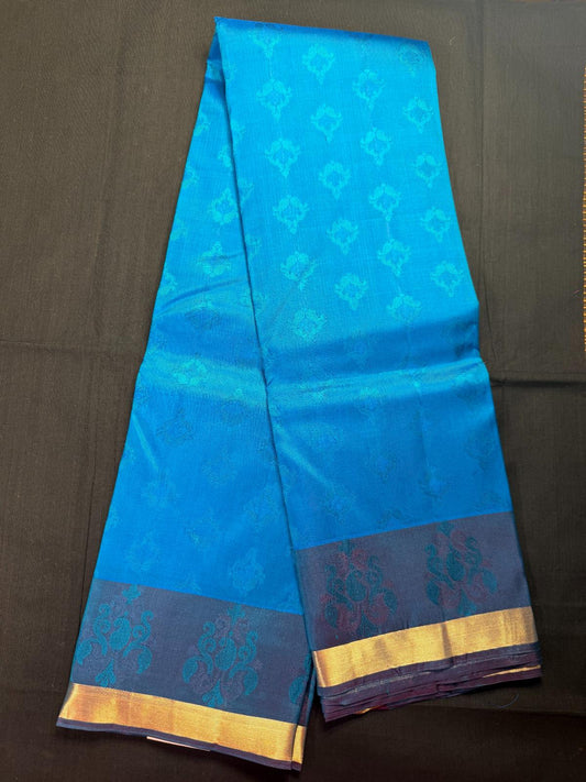 Teal blue pure Kanjivaram pattu with self jacquard butas all over and mango design in double and kadi border