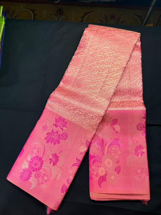 Peach and pink pure kanjivaram pattu with jacquard waves all over design, baby pink border including lotus flower, jari leaf design