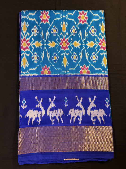 Teal Blue Ikkat Pochampallu With Big Border, Deers in Borders, Royal Blue With Gold Jari Border