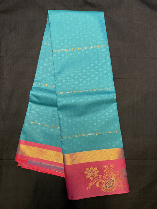 Peacock Green Fancy Saree, with jacquard all over, kadi border and pink border with mangoes