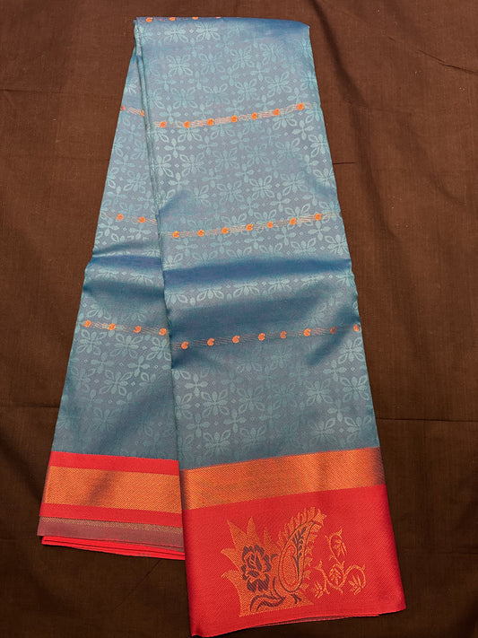 Peacock Blue Fancy Saree, with jacquard and mango butas all over, copper kadi border and maroon border with flowers and mangoes