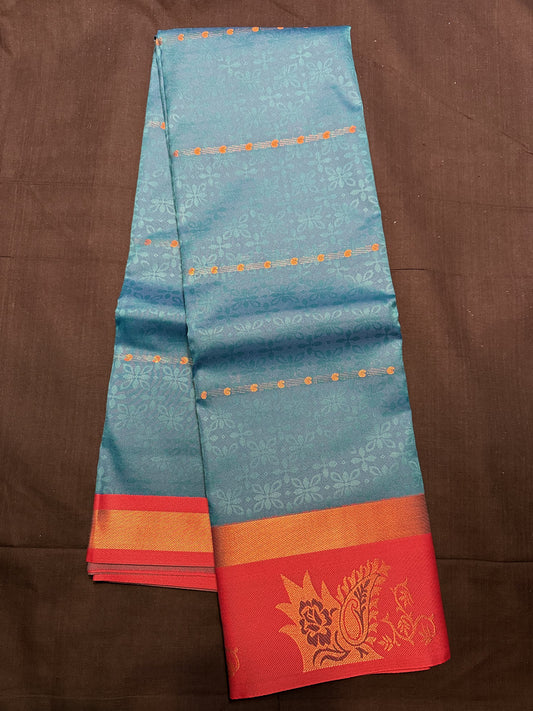 Peacock Blue Fancy Saree, with jacquard and mango butas all over, copper kadi border and maroon border with flowers and mangoes