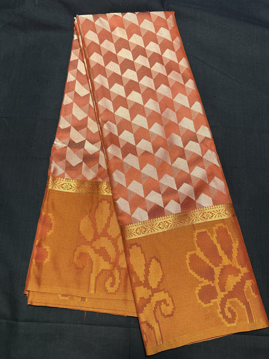 Burnt Orange Fancy Saree, with jacquard all over arrows design, kadi border and self border with floral design
