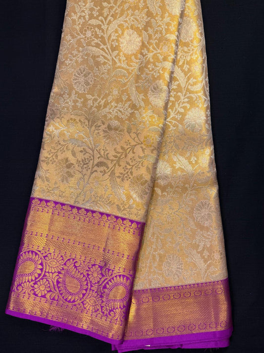 Gold jpure Kanjivaram pattu with jacquard all over, magenta with border with rudraksha and mango design