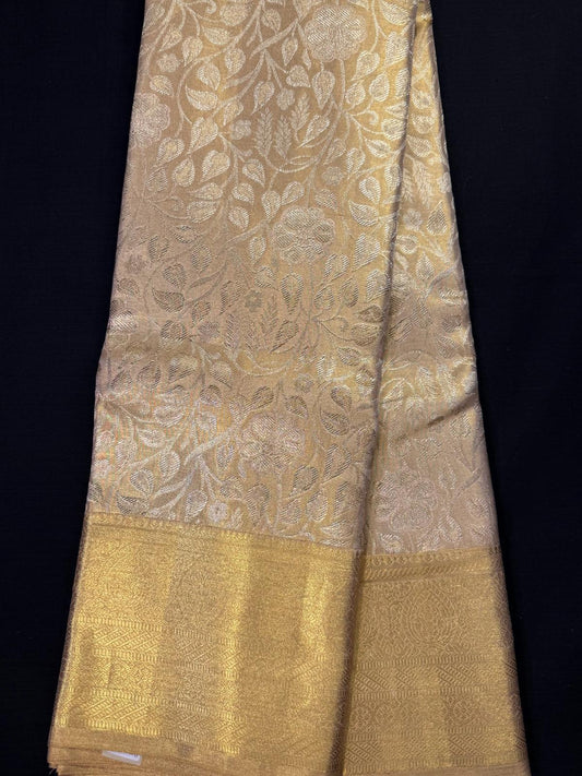 Beige Pure Kanjivaram Pattu with all overjacquard with silver and gold design, self border with heavy design